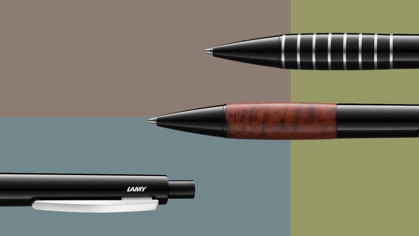 verschiedene LAMY Kugelschreiber angeschnitten auf farabigem Hintergrund