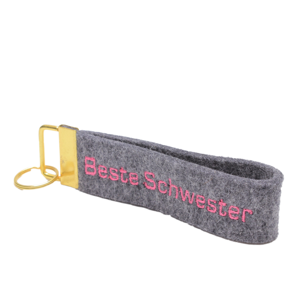 Beste Schwester pink auf grauen Filz zum Schlüsselanhänger von Hessenmädchen genäht